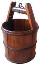 A 19TH CENTURY COOPERED FRUITWOOD PAIL, with iron banding and an iron ring fixture to the handle