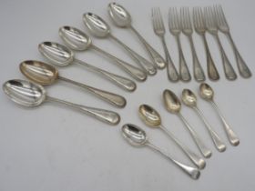 A GROUP OF SILVER FLAT WARE, the lot includes six table spoons and six matching table forks, all