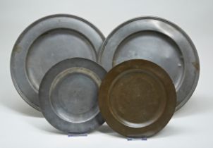 A PEWTER PLATE WITH A CENTRAL ARMORIAL, another engraved P.J.P. Barnards Inn, 1813 and a pair of