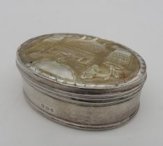 A LATE 19TH CENTURY SILVER AND MOTHER OF PEARL BOX, oval form, the hinged cover inset with carved