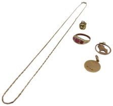 A 9CT GOLD RING AND TWO 9CT GOLD FOBS, the ring set with three graduated pink gemstones, along