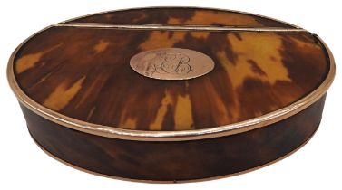 A GEORGE III GOLD MOUNTED TORTOISESHELL SNUFF BOX, CIRCA 1790, oval form, the hinged lid inset