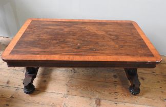 A WILLIAM IV ROSEWOOD AND SATIN WOOD CROSS BANDED TABLE, of reduced proportions, the rectangular top