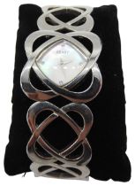 MODERN SEKSY WATCH Ladies boxed Seksy bracelet watch with mother of pearl dial. The bracelet with