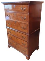 A GEORGE III MAHOGANY SECRETAIRE CHEST ON CHEST, CIRCA 1800, in two sections, the top section with a