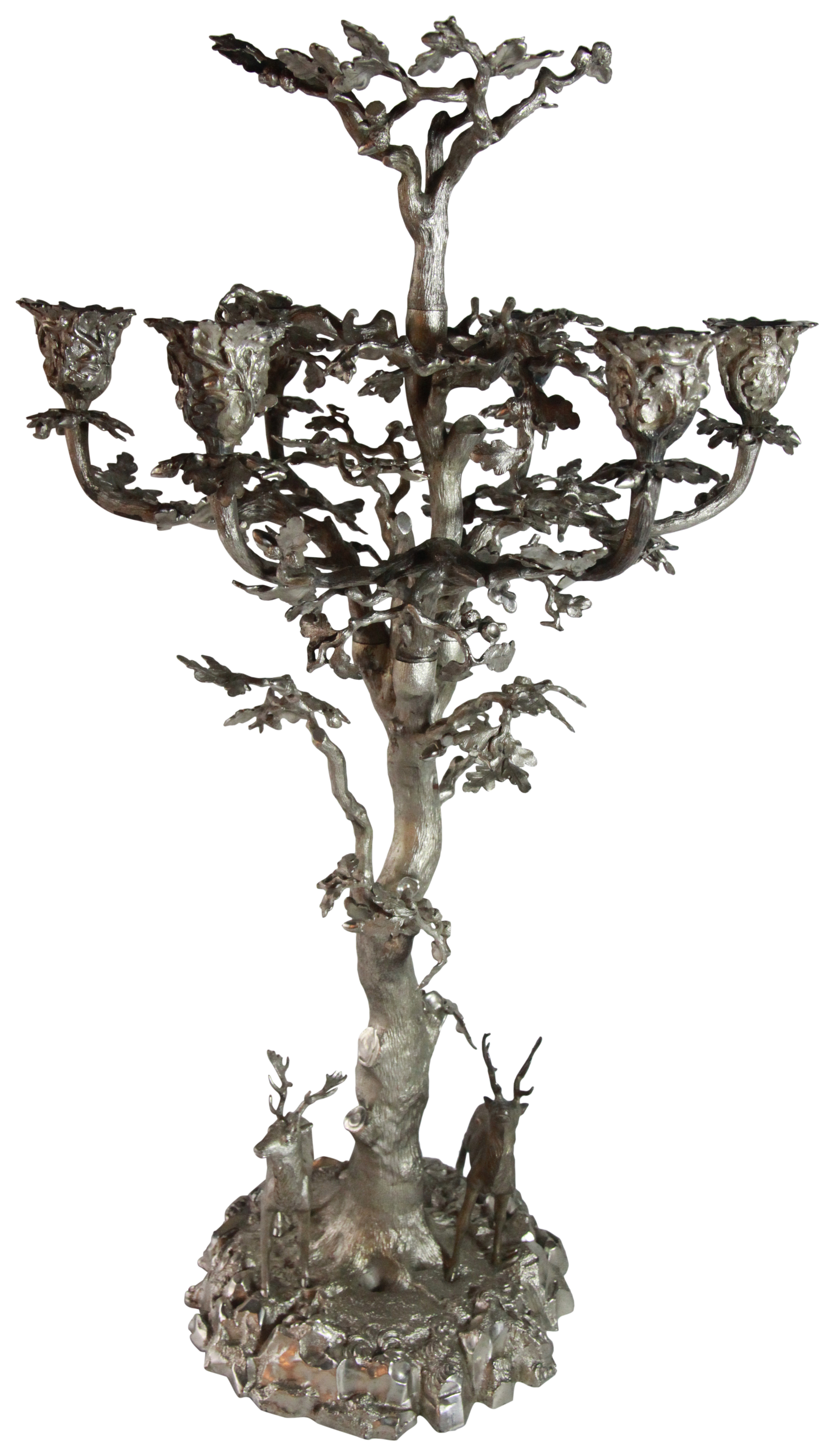 A massive six light silver candelabrum in the form of an oak tree with vase type sockets & 2