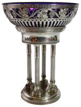 A interesting German silver centrepiece with blue bristol bowl upon Corinthian column bases (H: