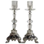 A pair of German Montain crystal candlesticks upon silver bases also with facit glass stone