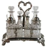 A Victorian silver & glass cruet set. 8 cruets upon a silver base - Rawlings & Summers 1839, (L: