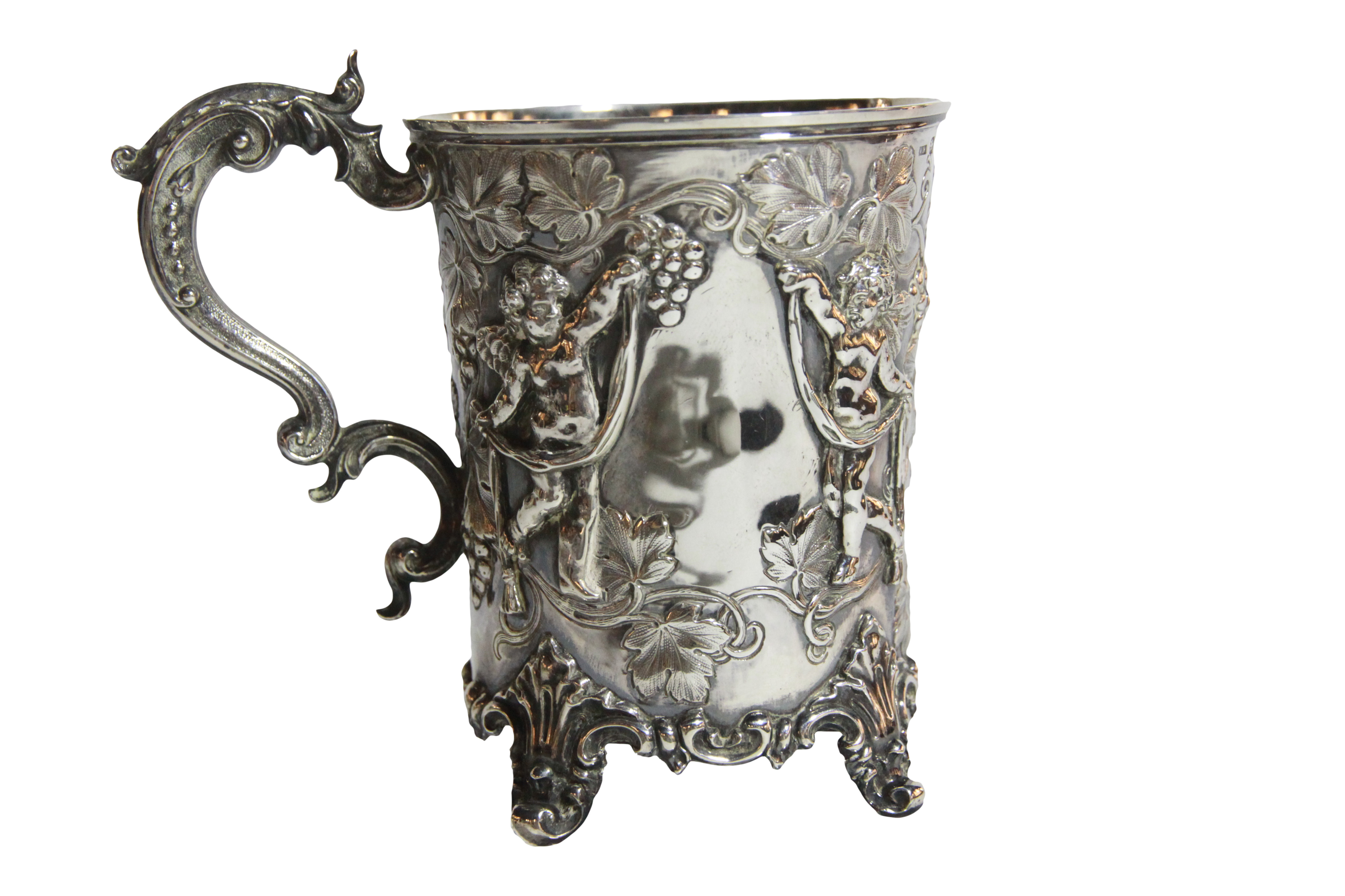 A superb silver beaker/ cup with cherub vine scrolled decoration upon four Roco scrolled feet, - Image 5 of 8