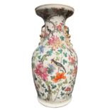 A good late 19th century Cantonese vase decorated with birds amongst foliage showing signs of