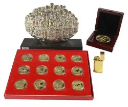 A Selection of 12 New Years decorative Chinese coins cased, also one other cased coin from Macau
