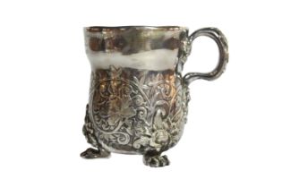 An unusual silver beaker/ cup with scrolled decoration of foliage upon tripod paw feet, 19th-century