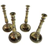 A good set of four French silver gilt candlesticks, - Circa 1920. with retailers stamp Mon Odiot