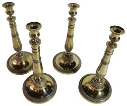 A good set of four French silver gilt candlesticks, - Circa 1920. with retailers stamp Mon Odiot