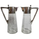 A pair of glass wine decanters with silver handles and lid - Prague 1915. (H: 17cm), PROVENANCE: