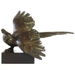 A large painted bronze of an eagle upon a marble plinth, (L: 40 cm), plinth signed 'Kelety',