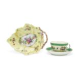 A WORCESTER 'SPOTTED FRUIT' CUP AND SAUCER Circa 1770 with apple green ground, together with a