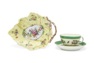 A WORCESTER 'SPOTTED FRUIT' CUP AND SAUCER Circa 1770 with apple green ground, together with a