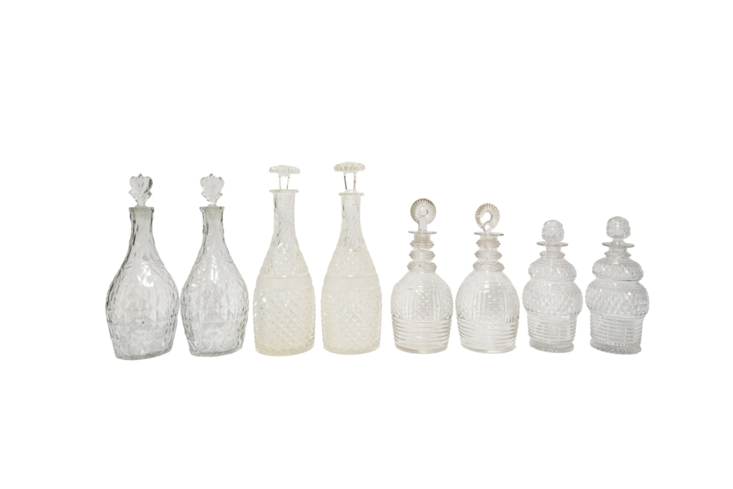 FOUR PAIRS OF VINTAGE GLASS DECANTERS, various sizes and styles, cut glass and moulded glass