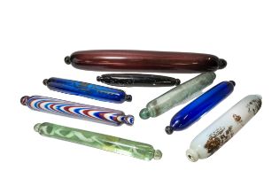 A MIXED GROUP OF 19TH CENTURY GLASS ROLLING PINS, the lot includes a Nailsea rolling pin, a