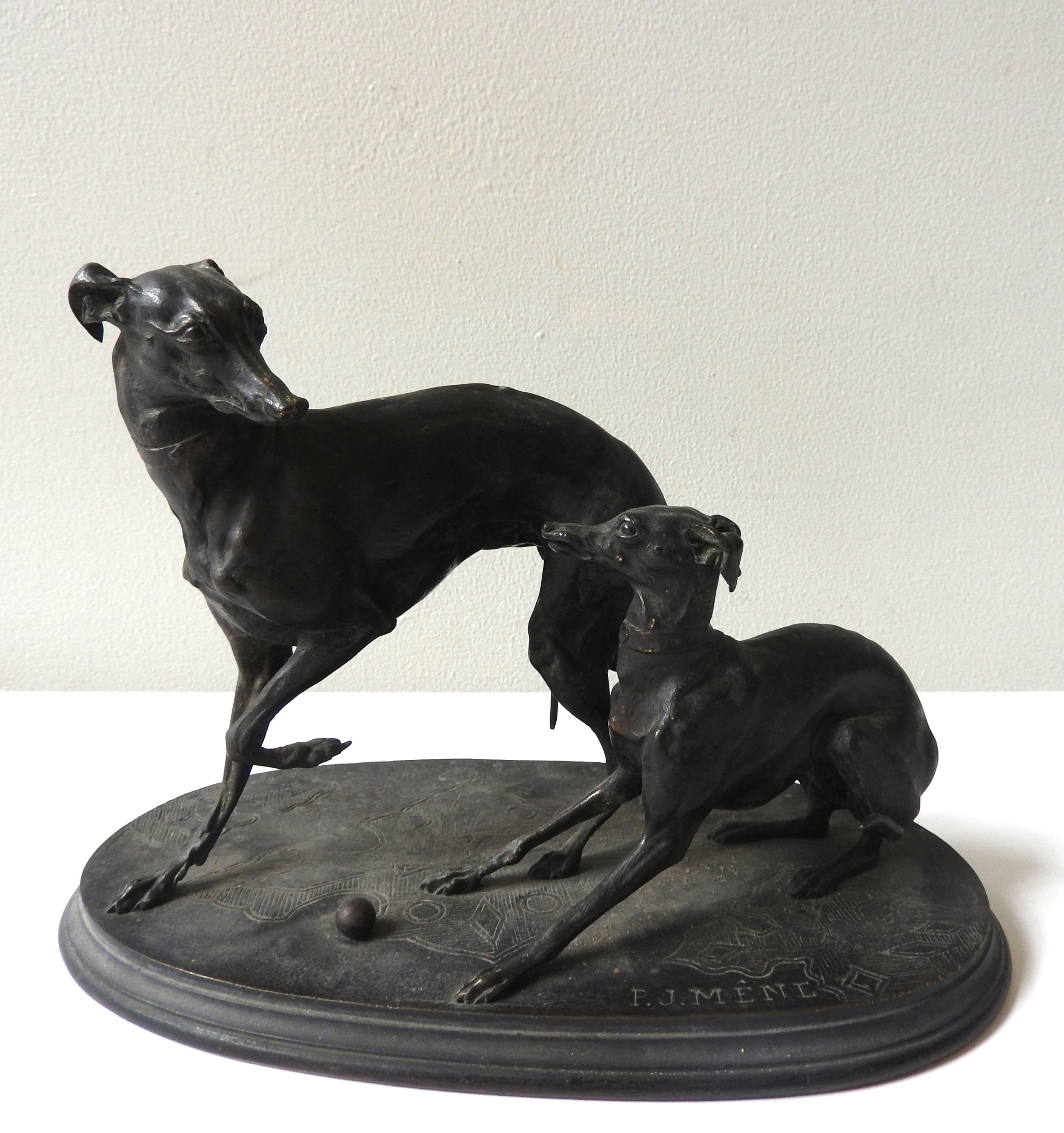 AFTER PIERRE JULES MENE (1810-1879) BRONZE GROUP OF TWO HOUNDS, modelled playing with a ball, raised