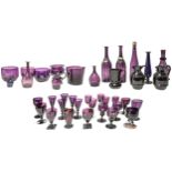 A LARGE MIXED GROUP OF AMETHYST GLASS WARES, 18TH/19TH CENTURY, the lot includes a good pair of