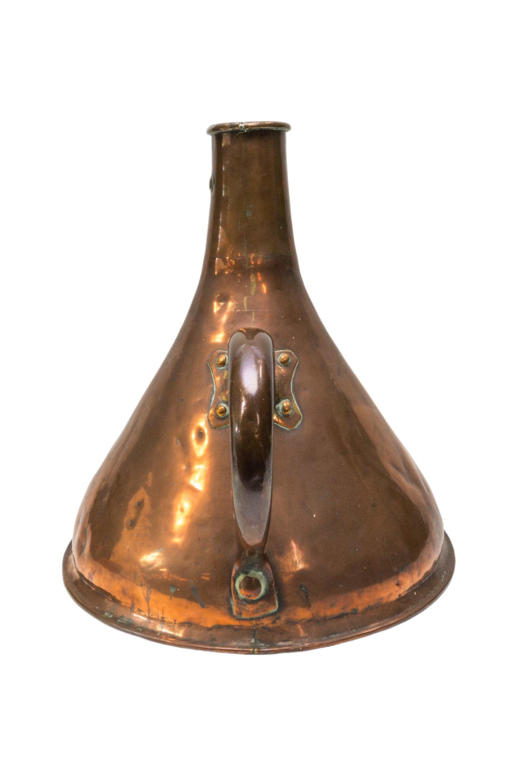 A LARGE COPPER MEASURE with narrow neck, loop handle and GR weights and measures stamp. 40 cms high.
