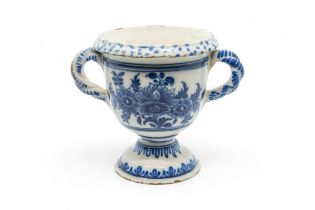 A FRENCH FAIENCE TWIN HANDLED FLOWER POT Early 18th century, 15.5cms high,