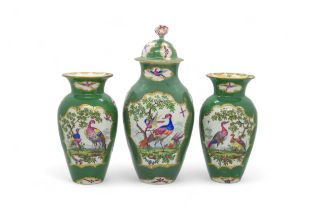 A WORCESTER GREEN GROUND FANCY BIRDS GARNITURE Circa 1775, comprising a covered vase and two