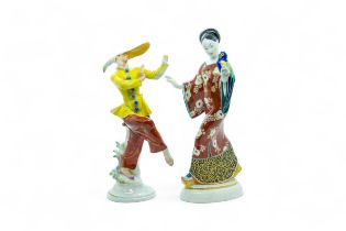 A 20TH CENTURY MEISSEN COMEDIA DEL ARTE FIGURE Together with a KPM figure of a Japanese woman,