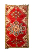 A HAND KNOTTED WOOL TURKISH RUG, LATE 19TH / EARLY 20TH CENTURY, probably Turkish, fair condition