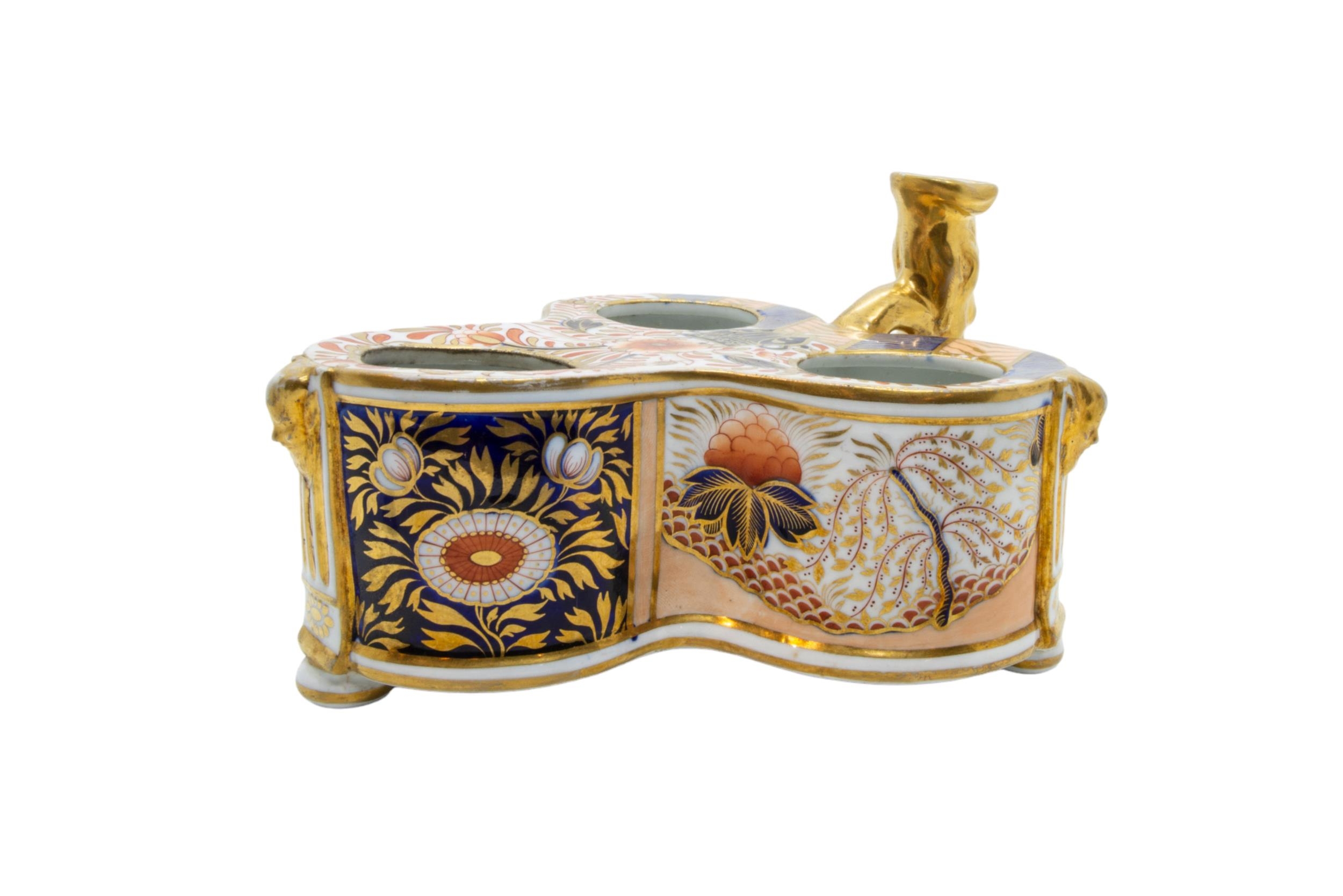 A CROWN DERBY TRIFORM INK STAND, 19TH CENTURY, the gilded handle / sconce modelled as a fish,