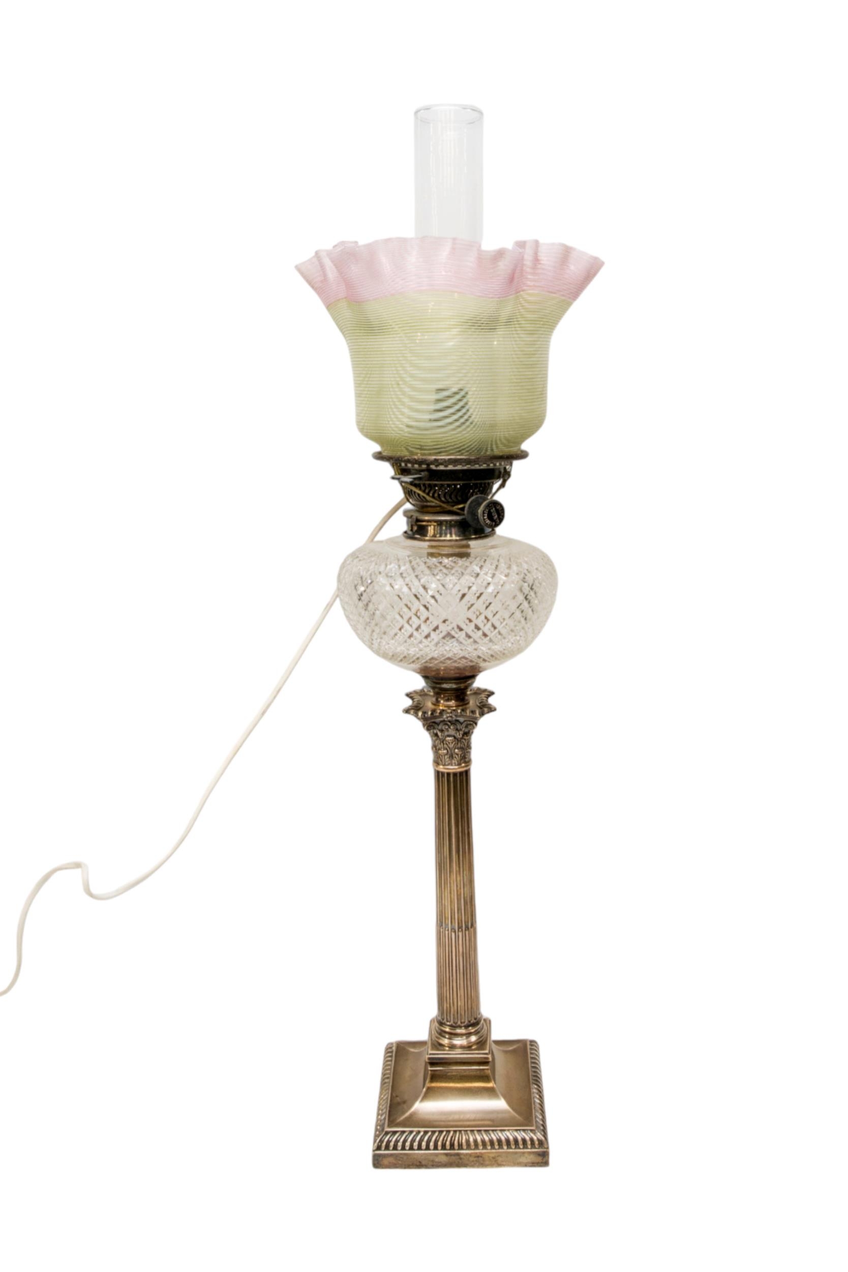 A SILVER CORINTHIAN COLUMN OIL LAMP with cut glass reservoir and vaseline type shade. 66 - Image 2 of 2