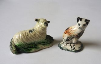 A CREAMWARE SHEEP AND A PEARLWARE CAT Circa 1800, sheep is 8cms