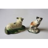 A CREAMWARE SHEEP AND A PEARLWARE CAT Circa 1800, sheep is 8cms