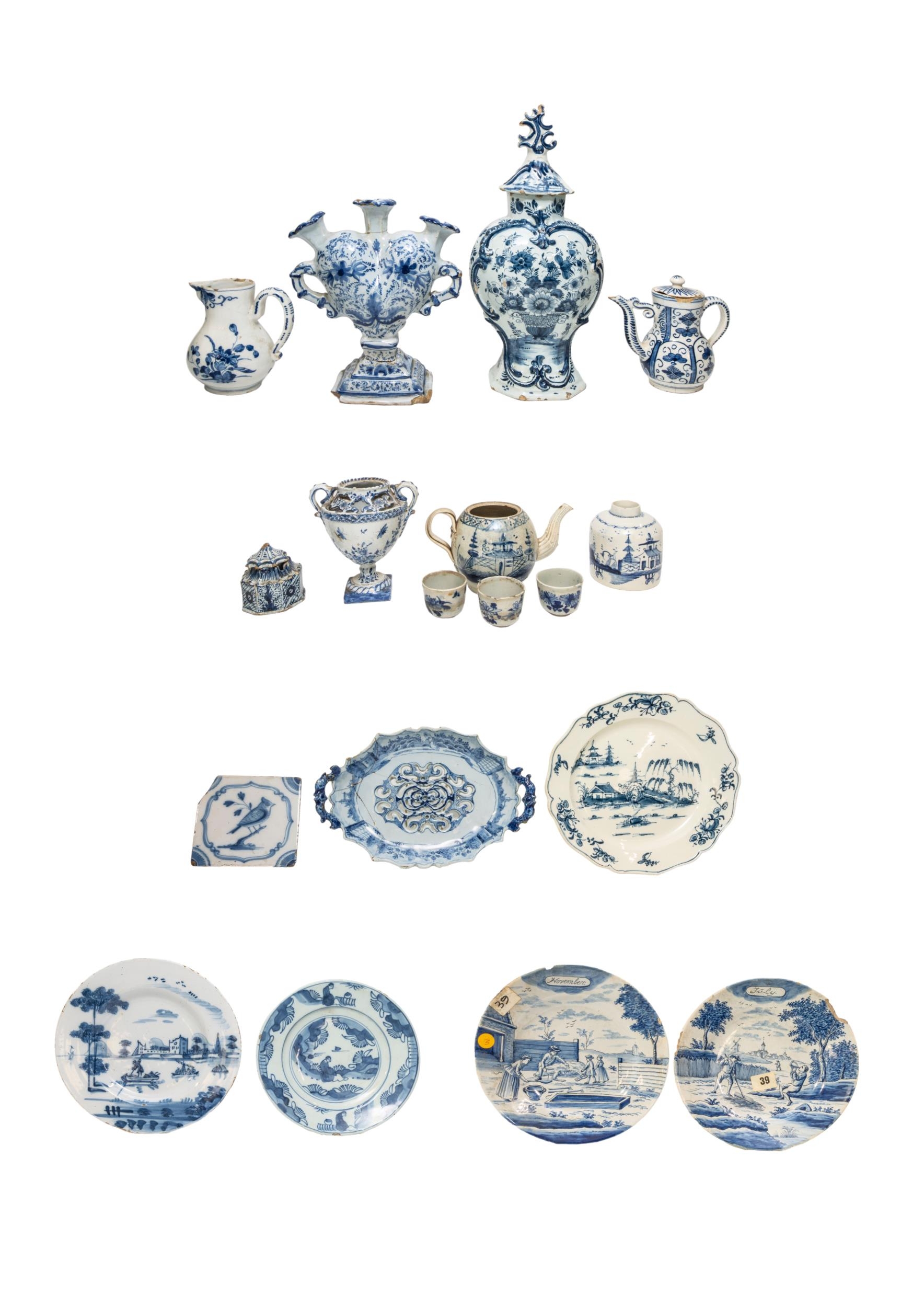 A MIXED GROUP OF DELFT WARES, PREDOMINANTLY 19TH CENTURY, the lot includes a heart shaped tulip
