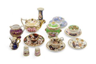 A COLLECTION OF MINIATURES A Spode claret ground jug with raised paste gilding, a teapot, two