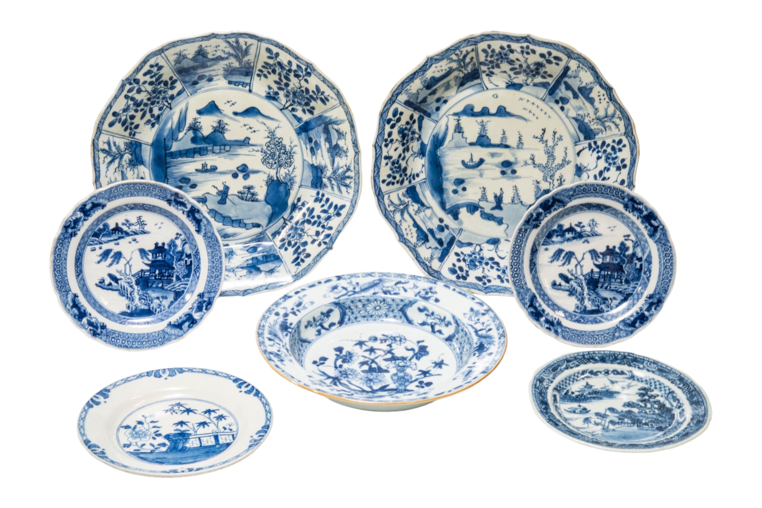 A PAIR OF CHINESE BLUE AND WHITE DISHES QING DYNASTY, 18TH CENTURY 26cm diam; together with A