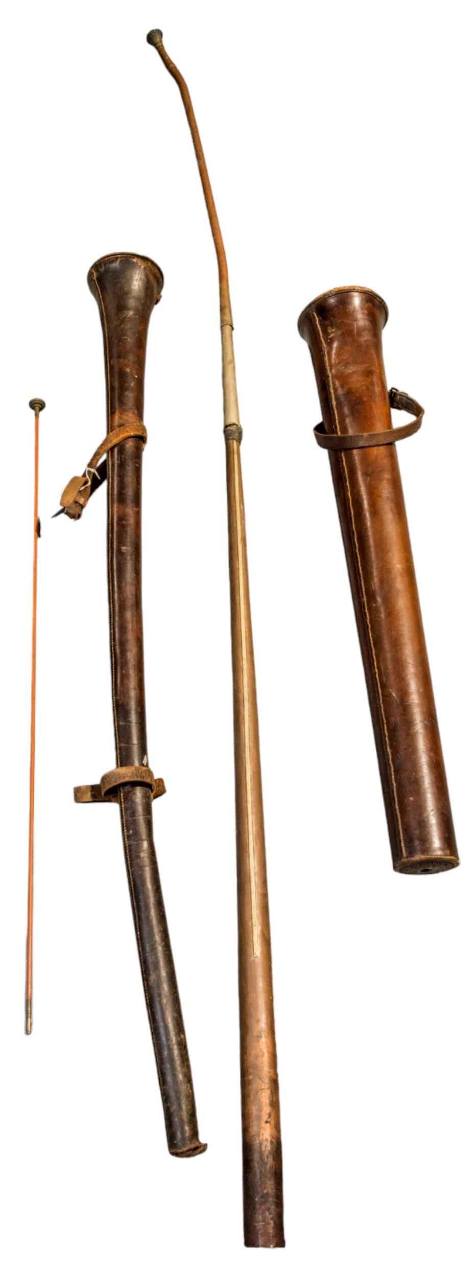 A COPPER COACHING HORN IN A LEATHER CASE, a leather coaching horn case and a ‘made-up’ long copper
