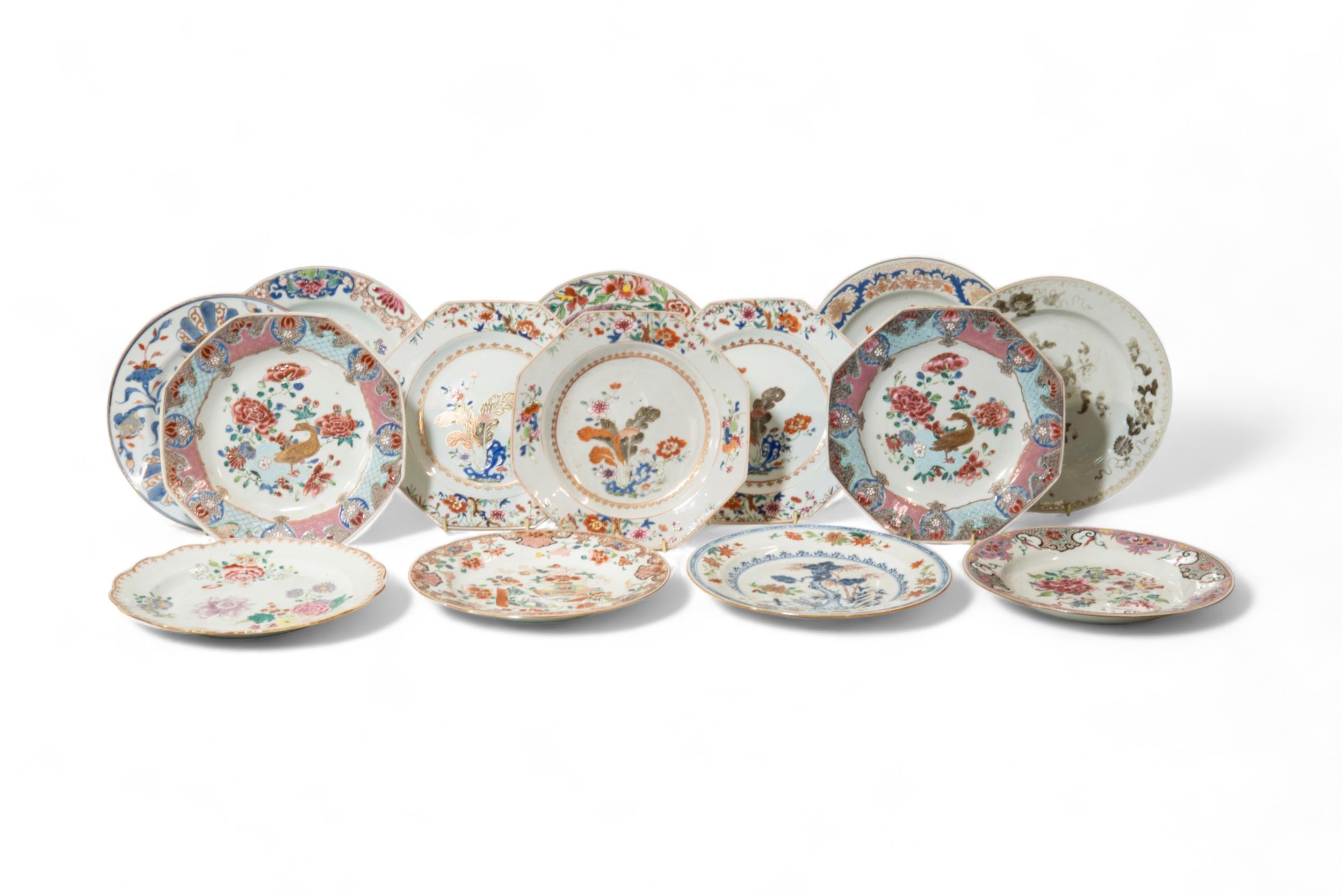 A GROUP OF FOURTEEN CHINESE EXPORT DISHES QING DYNASTY, 18TH CENTURY 22cm - 23cm diam approx