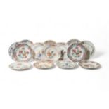 A GROUP OF FOURTEEN CHINESE EXPORT DISHES QING DYNASTY, 18TH CENTURY 22cm - 23cm diam approx