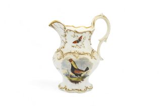 A COCK FIGHTING JUG Dated 1816, and painted with two fighting cocks, 21cms high.