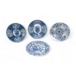 A GROUP OF FOUR CHINESE BLUE AND WHITE DISHES KANGXI PERIOD (1662-1722) 25cm - 28cm diam