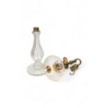 A PAIR OF 19TH CENTURY CUT GLASS OIL LAMP BASES OF BALUSTER FORM, the cut reservoirs later converted