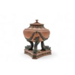 A WEDGWOOD ROSSO ANTICO PASTILLE BURNER Impressed 'JOSIAH WEDGWOOD FEB 2 1805' and raised on dolphin