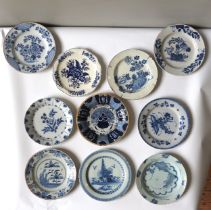 A DUTCH DELFT 'PEACOCK' DISH, 18TH CENTURY, with an ochre painted rim, along with nine other Delft