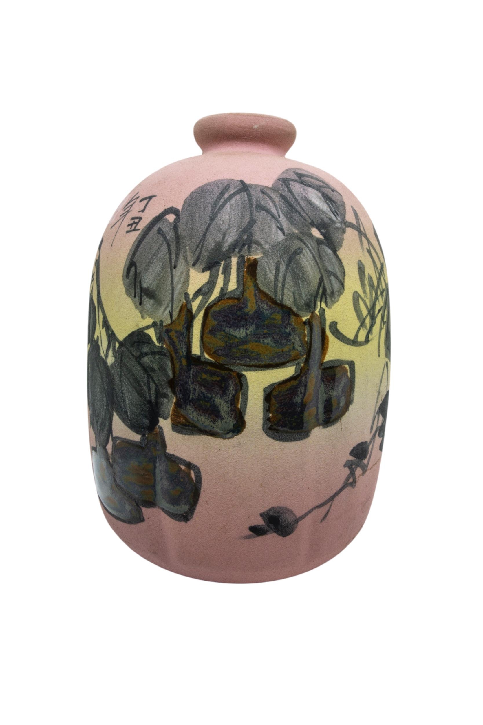 A JAPANESE LOBED LANTERN FORM VASE, the matte porcelain sides painted with peach blossoms, the