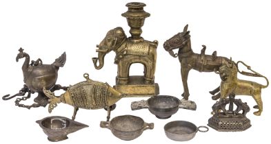 AN INDIAN COPPER ALLOY ELEPHANT ‘CANDLESTICK’, a horse, a wheel-along-fish, an oil lamp, and other