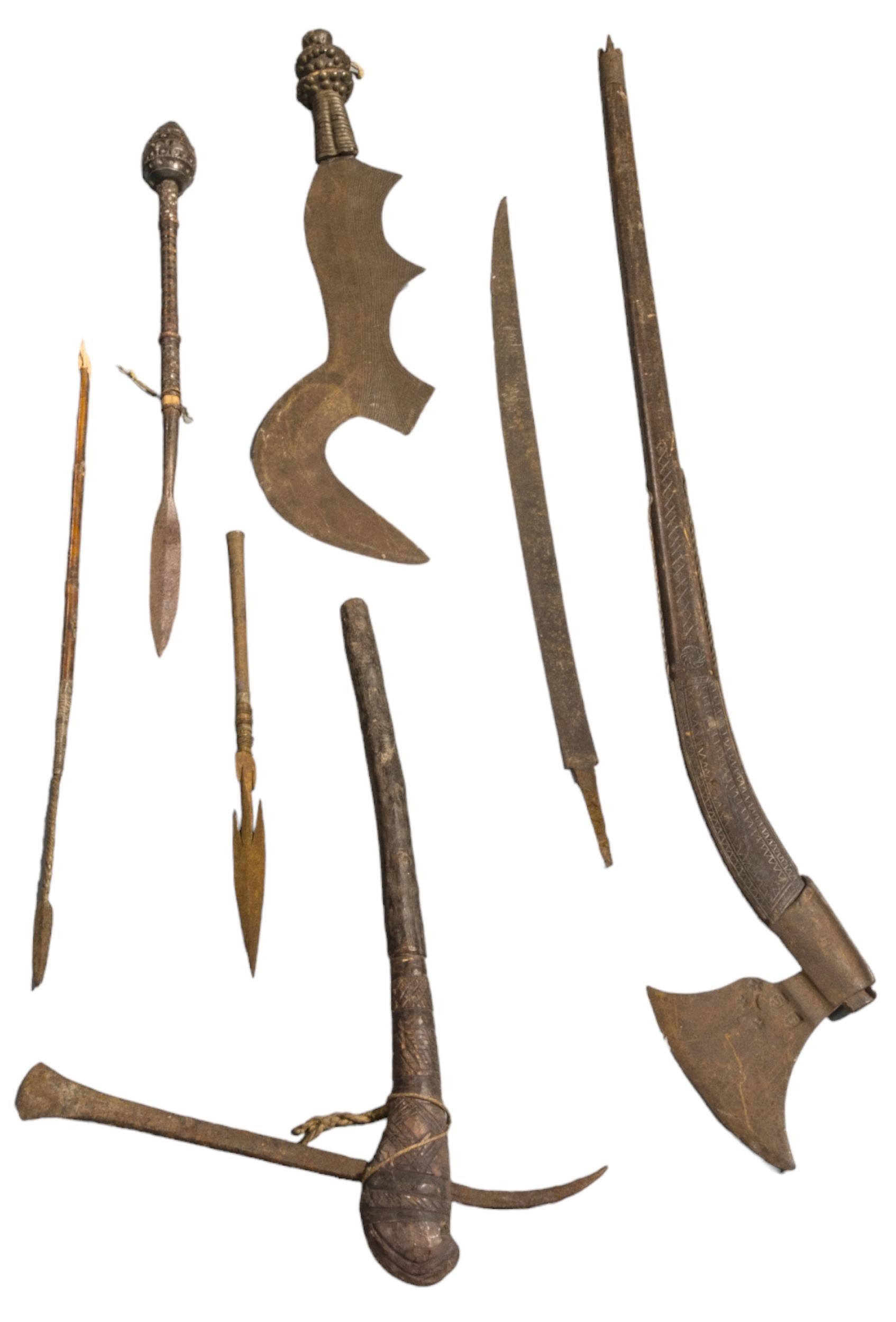 AN NGOMB 'RITUAL' SWORD WITH LINE DECORATED BLADE and double knopped hilt, other tribal weapons